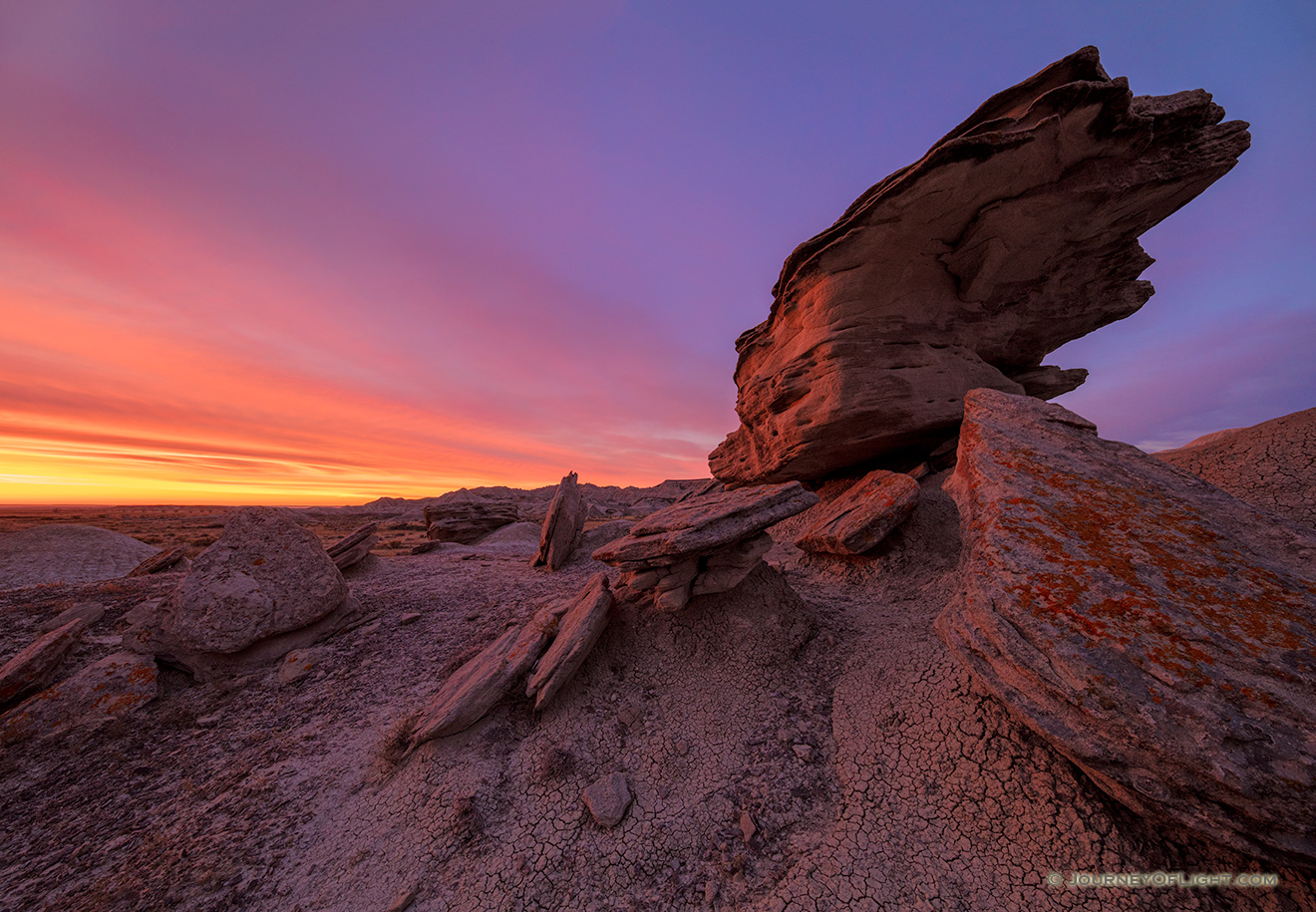 Scenic landscape photograph of a beautiful dawn over Toadstool Geologic Park in western Nebraska. - Nebraska Picture