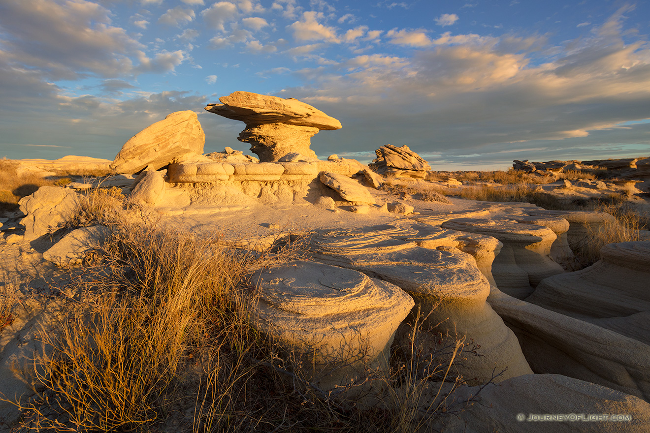 Scenic landscape photograph of Toadstool Geologic Park in western Nebraska at dusk. - Nebraska Picture