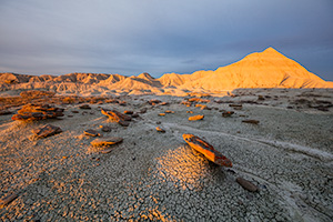 Scenic landscape photograph of Toadstool Geologic Park illuminated by morning light in western Nebraska. - Nebraska Photograph