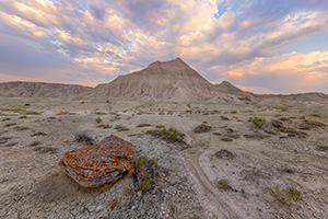 A scenic landscape photograph of twilight over the badlands Toadstool Geologic Park in western Nebraska. - Nebraska Photograph