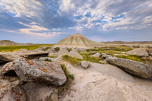 A scenic landscape photograph of Toadstool Geologic Park in western Nebraska in the late afternoon. - Nebraska Photograph