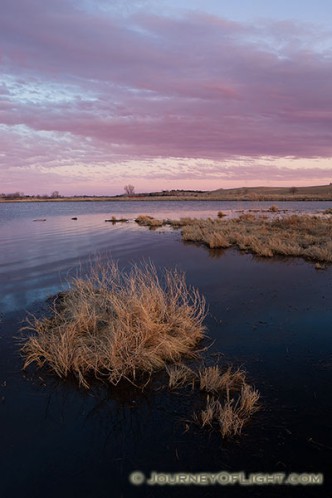 Dusk descends over a pond on the Little Salt Fork Marsh in Lancaster County near Raymond, Nebraska.