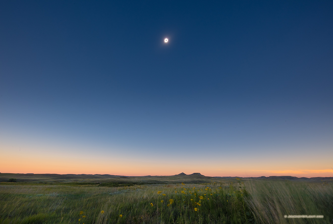 During Totality of the Total Solar Eclipse Agate Fossil Beds National Monument appears to plunge briefly into twilight while the sun