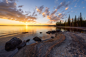 Scenic landscape photograph of a sunrise over Lake Yellowstone, Yellowstone National Park, Wyoming. - Wyoming Landscape Photograph