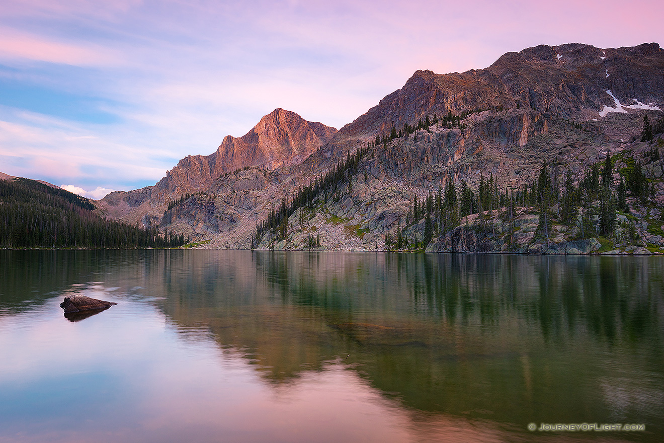 Nestled under Andrews Peak, dusk falls on the beautiful Nanita Lake in the backcountry of Rocky Mountain National park. - Colorado Picture