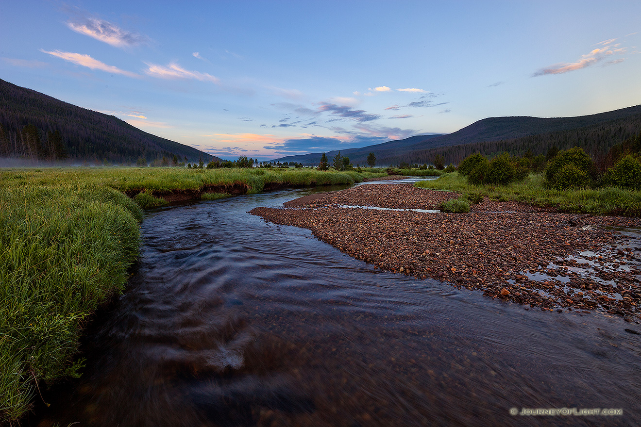 The head of the Colorado River runs through the Kawuneeche Valley in western Rocky Mountain National Park.  Here it is a quiet stream that is quite easy to across, much different than the raging river found at the bottom of the Grand Canyon. - Colorado Picture