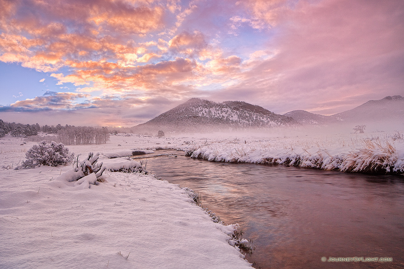 On a cold day in mid-May, the Big Thompson flows through Moraine Park as the first sunlight of the day illuminates clouds to the east. - Rocky Mountain NP Picture