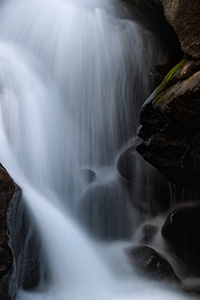 Water flows over the rocks at Cascade Falls on the North Inlet Stream in Rocky Mountain National Park, Colorado. - Colorado Nature Photograph