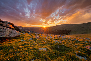 The setting sun shines for the last few seconds as it sets behind the Never Summer Range at Rocky Mountain National Park. - Colorado Landscape Photograph