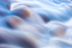 Swollen from several inches of rain, the full and fast Big Thompson River flows through Rocky Mountain National Park. - Colorado Photograph