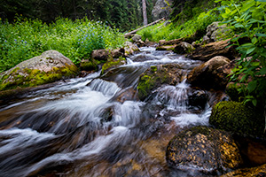 Scenic landscape photograph of cascades found just below Fourth Lake in the backcountry of Rocky Mountain. - Colorado Photograph