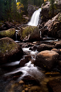 A popular hiking destination, Alberta falls at Rocky Mountain National Park roars downhill. - Colorado Photograph