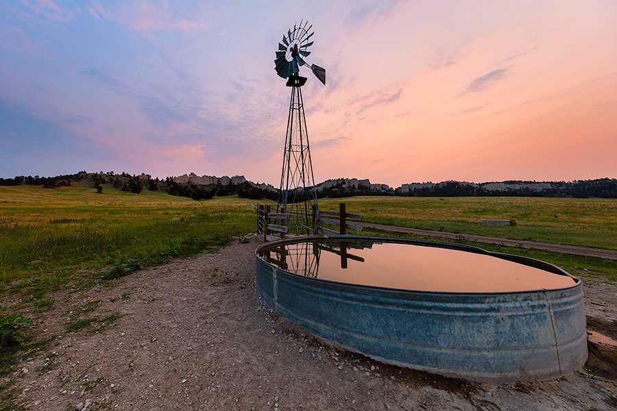 A Nebraska landscape scenic photograph of a windmill at sunset at Fort Robinson, Nebraska. - Nebraska Photography