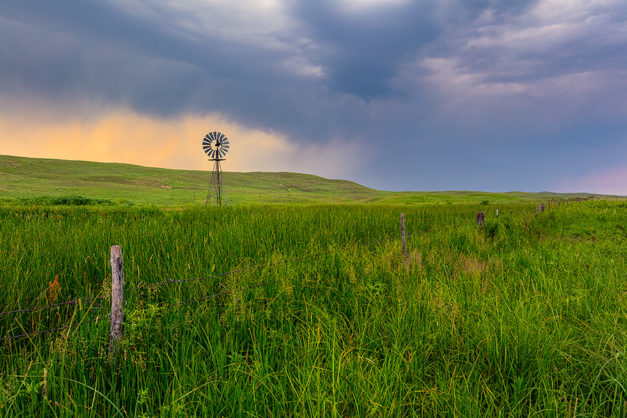 A Nebraska landscape scenic photograph of a windmill during a storm in the Sandhills of Nebraska. - Nebraska Photography