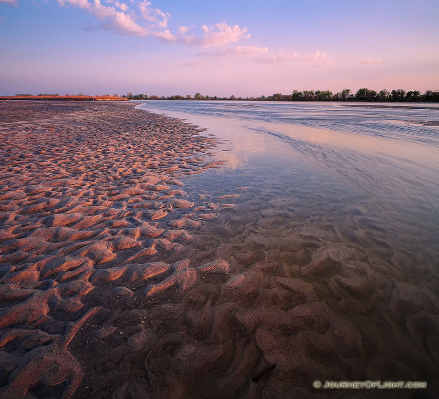 On a sandbar near Two Rivers State Recreation Area, the Platte River flows into the distance as the sun sets to the west. - Nebraska Photography