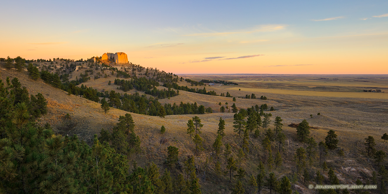 A scenic landscape photograph of a beautiful sunrise on Lover's Leap at Ft. Robinson in Northwestern Nebraska. - Nebraska Picture