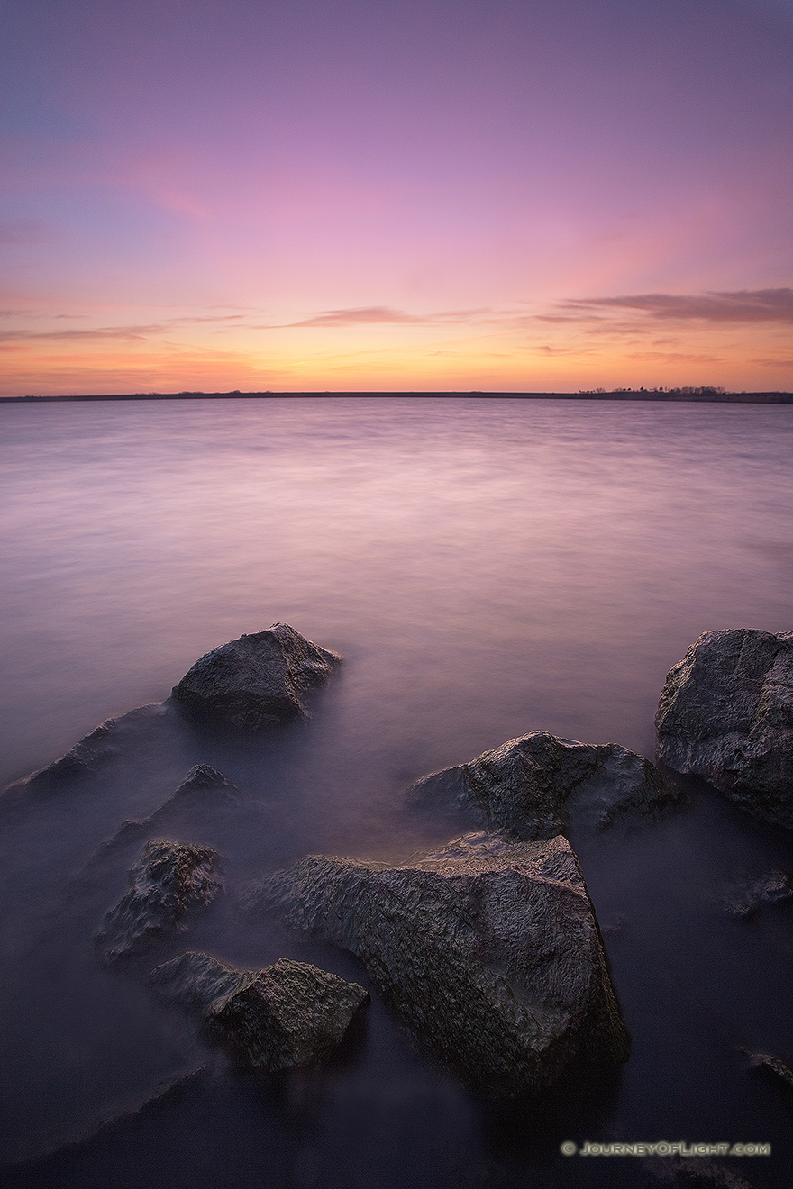 Just before sunrise on a fall morning, the early morning light begins to illuminate Branched Oak Lake in Lancaster County, Nebraska. - Nebraska Picture