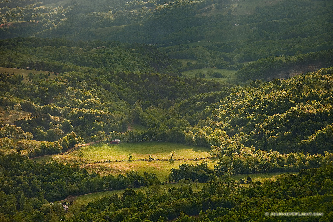 Rays of light illuminate the hills of the Ozarks in Northern Arkansas. - Arkansas Picture