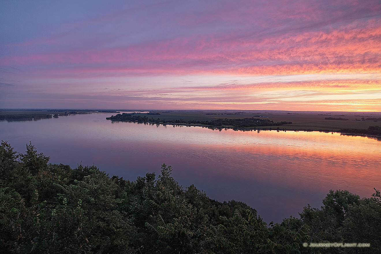 A beautiful sunrise illuminates the Missouri River from the scenic overlook at Ponca State Park in Dixon County. - Nebraska Picture