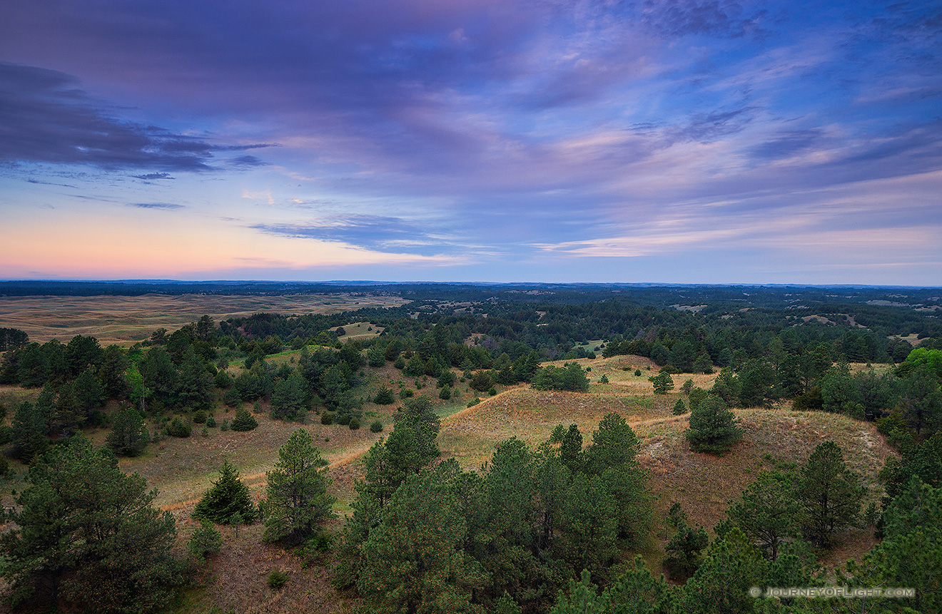 Clouds roll over Halsey National Forest in the central Nebraska.  From the Scott Tower lookout the largest handplanted forest in the United States extends into the distance. - Sandhills Picture