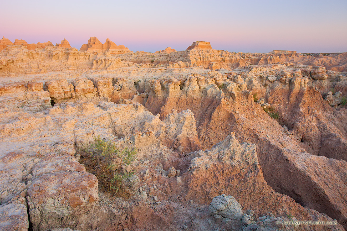 Warm sunlight hits the Badlands of South Dakota in Badlands National Park. - South Dakota Picture