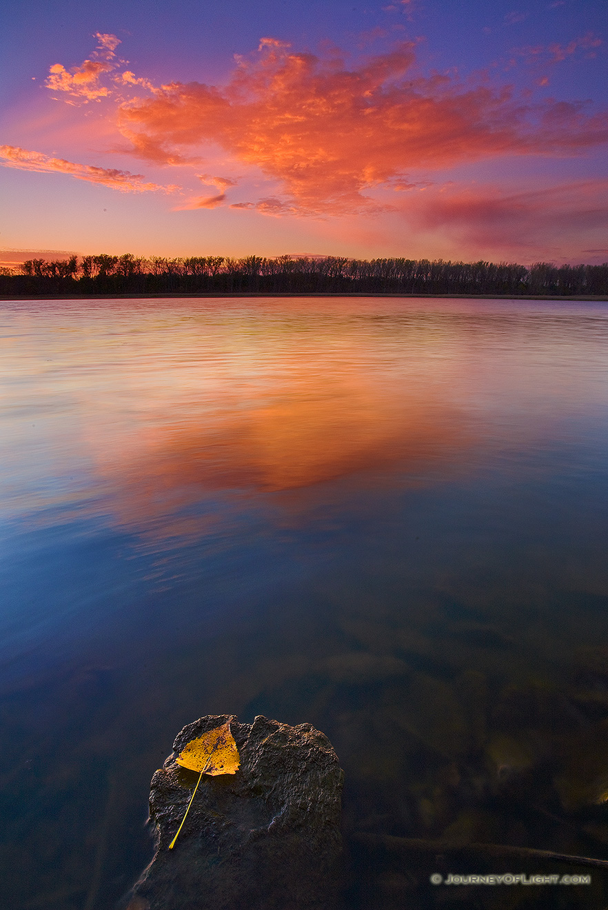 A light breeze moved the water along the DeSoto oxbow at DeSoto National Wildlife Refuge as the sun set below the horizon. - DeSoto Picture