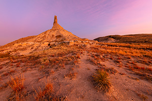 A scenic landscape Nebraska photograph of a sunset and Chimney Rock in western Nebraska. - Nebraska Photograph