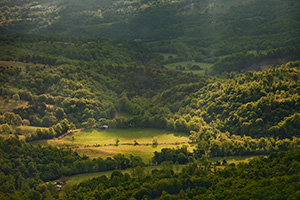 Rays of light illuminate the hills of the Ozarks in Northern Arkansas. - Arkansas Photograph