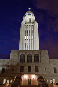 The Nebraska state capitol building in Lincoln at sunset on a cool spring evening.  This building houses the only state unicameral type government in the United States. - Nebraska Photograph