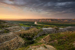 Sunlight streams across the Little Missouri valley in the North Unit of Theodore Roosevelt National Park, North Dakota. - North Dakota Landscape Photograph