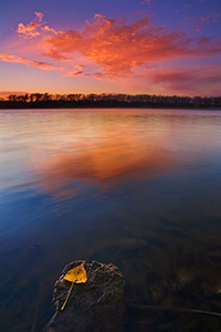 A light breeze moved the water along the DeSoto oxbow at DeSoto National Wildlife Refuge as the sun set below the horizon. - Nebraska Photograph