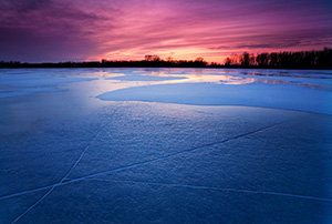 The former oxbow of the Missouri River, DeSoto Bend is completely frozen on a frigid January evening. - Nebraska Photograph