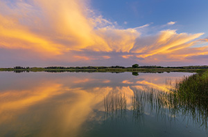 A scenic landscape photograph of Dewey Lake, Valentine National Wildlife Refuge, Nebraska. - Nebraska Photograph