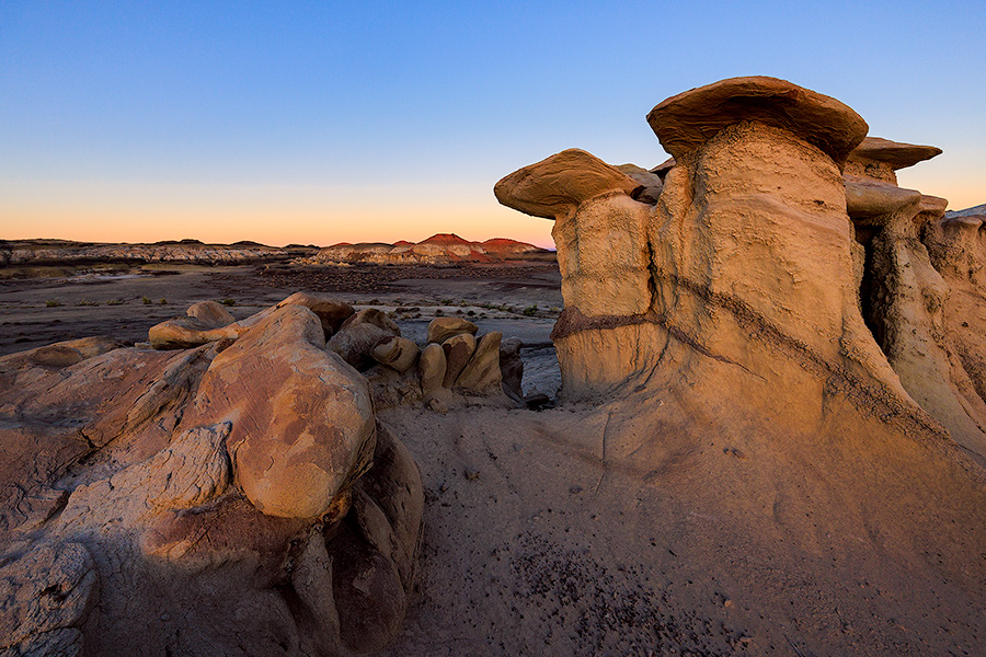 Scenic photograph of a sunrise at Bisti Badlands, New Mexico. - New Mexico Photography