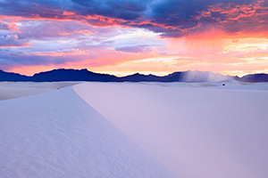 Scenic photograph of a sunset at White Dunes National Park, New Mexico. - New Mexico Photograph