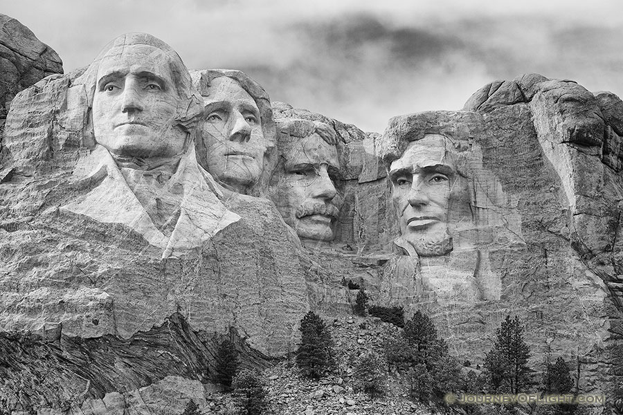 Soft afternoon light illuminates Mt. Rushmore National Monument in the Black Hills of South Dakota on a slightly overcast day. - Mt. Rushmore NM Photography