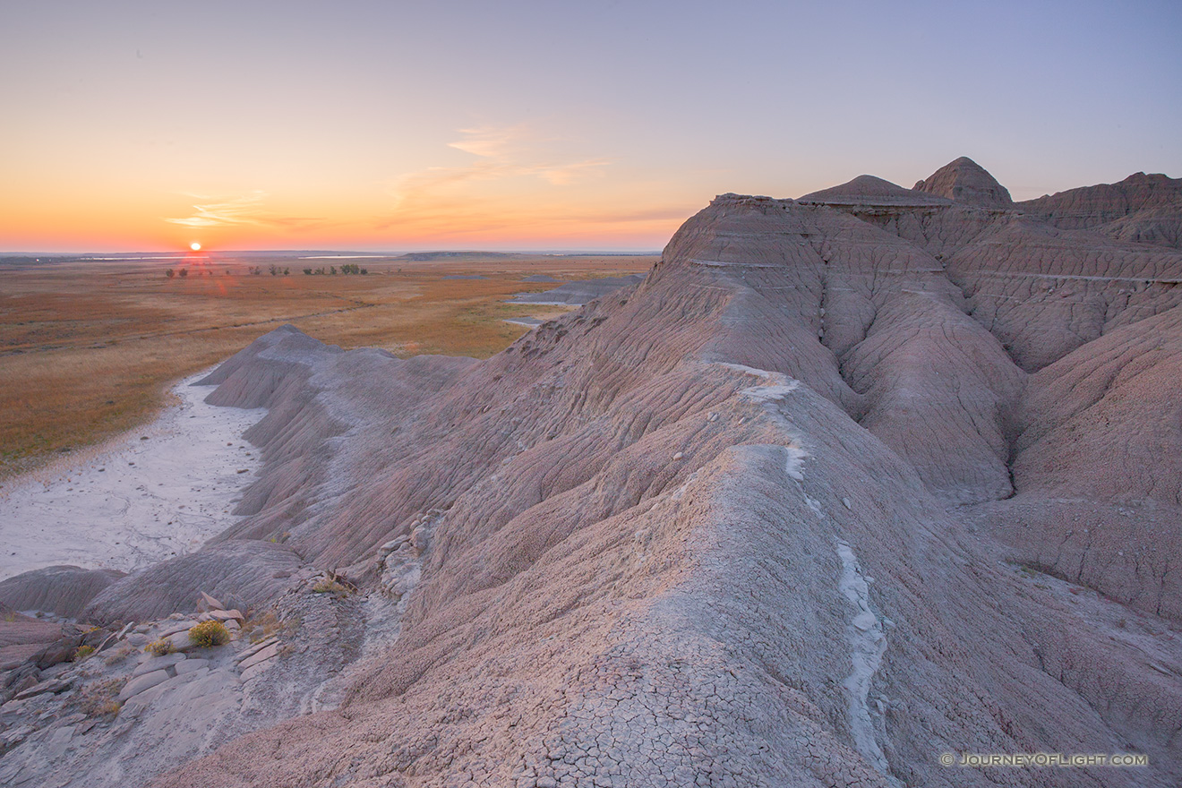 The sun rises over the western Nebraska plains from atop a ridge in Toadstool Geologic Park. - Toadstool Geologic Park Picture