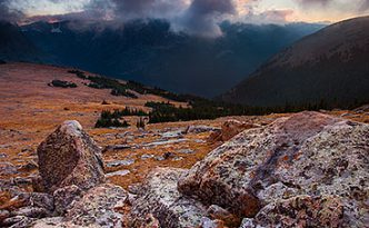There was a chill in the air as evening descended across Rocky Mountain National Park. From the treeless tundra, the view of the valley was uninhibited while the clouds rolled across the tips of the mountains. It is during these times I fully comprehend the feelings described by John Denver in his songs.