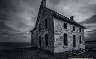Gone Forever on the Nebraska Plains - An Abandoned Farm House Sits Alone on the Prairie