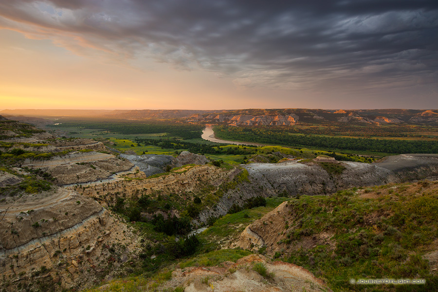 Sunlight streams across the Little Missouri valley in the North Unit of Theodore Roosevelt National Park, North Dakota.