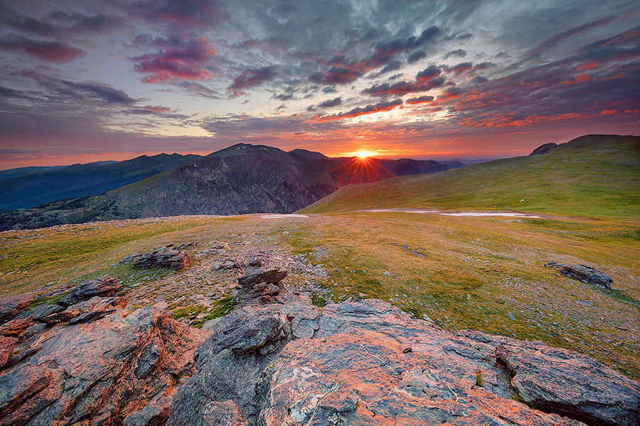 A photograph of a beautiful sunset on the tundra landscape of Rocky Mountain National Park in Colorado. - Colorado Photography
