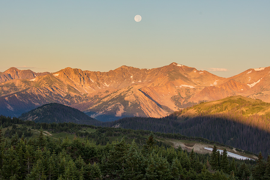 Landscape scenic photograph of the moon setting over the Never Summer Mountain Range, Rocky Mountain. - Colorado Photography