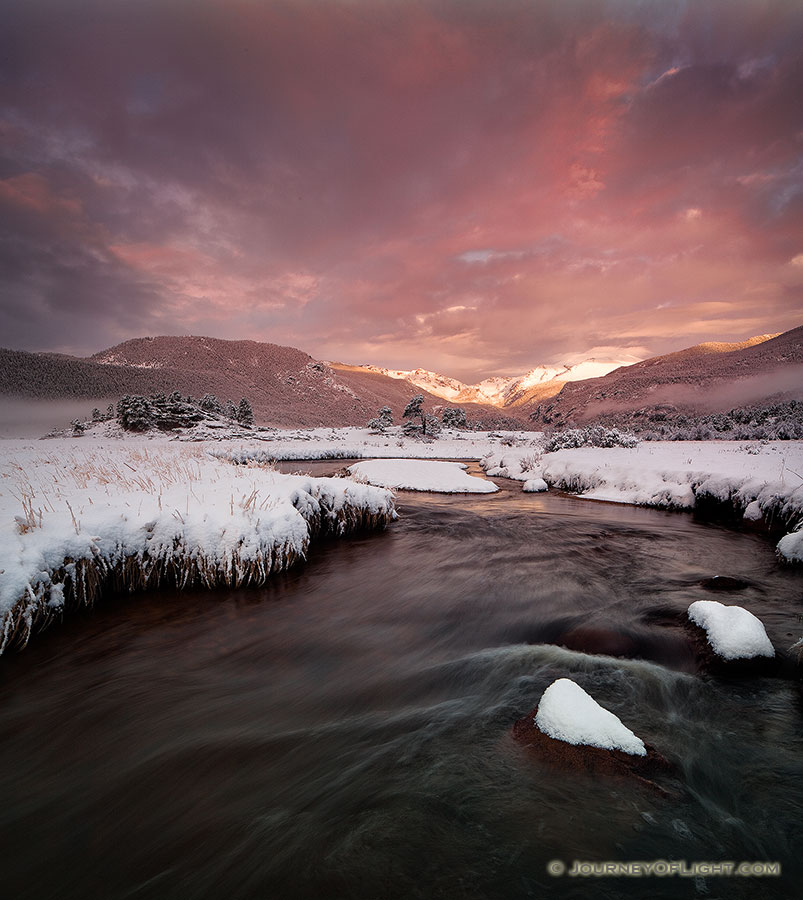 On a cold day in mid-May, the Big Thompson flows through Moraine Park as the first sunlight of the day illuminates the peaks of the Continential Divide. - Rocky Mountain NP Photography