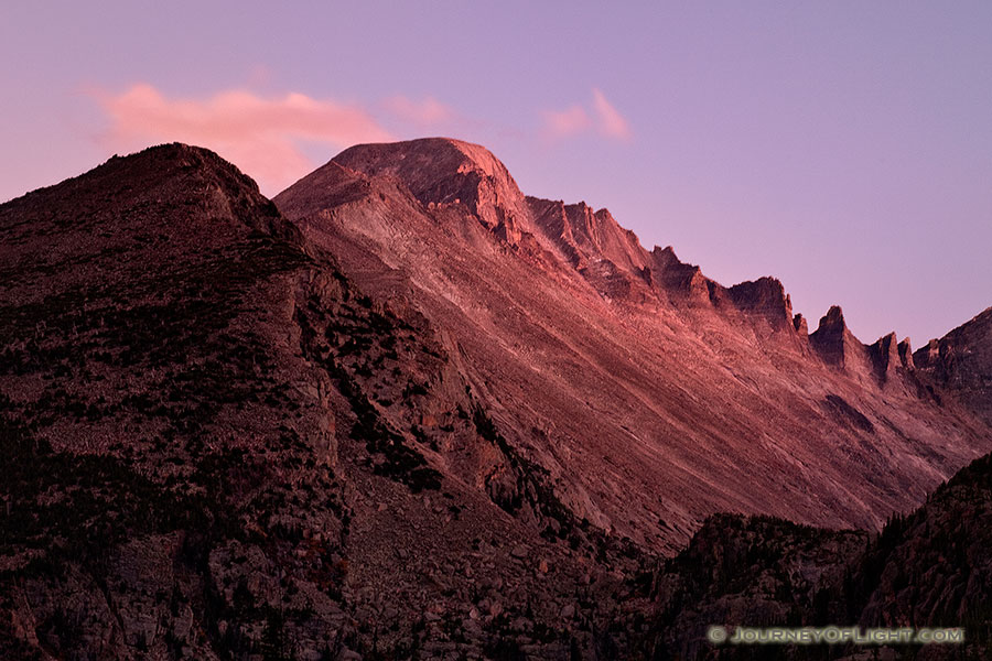 The last light of sunset emblazens Long's Peak with a crimson hue before dimming into night. - Rocky Mountain NP Photography