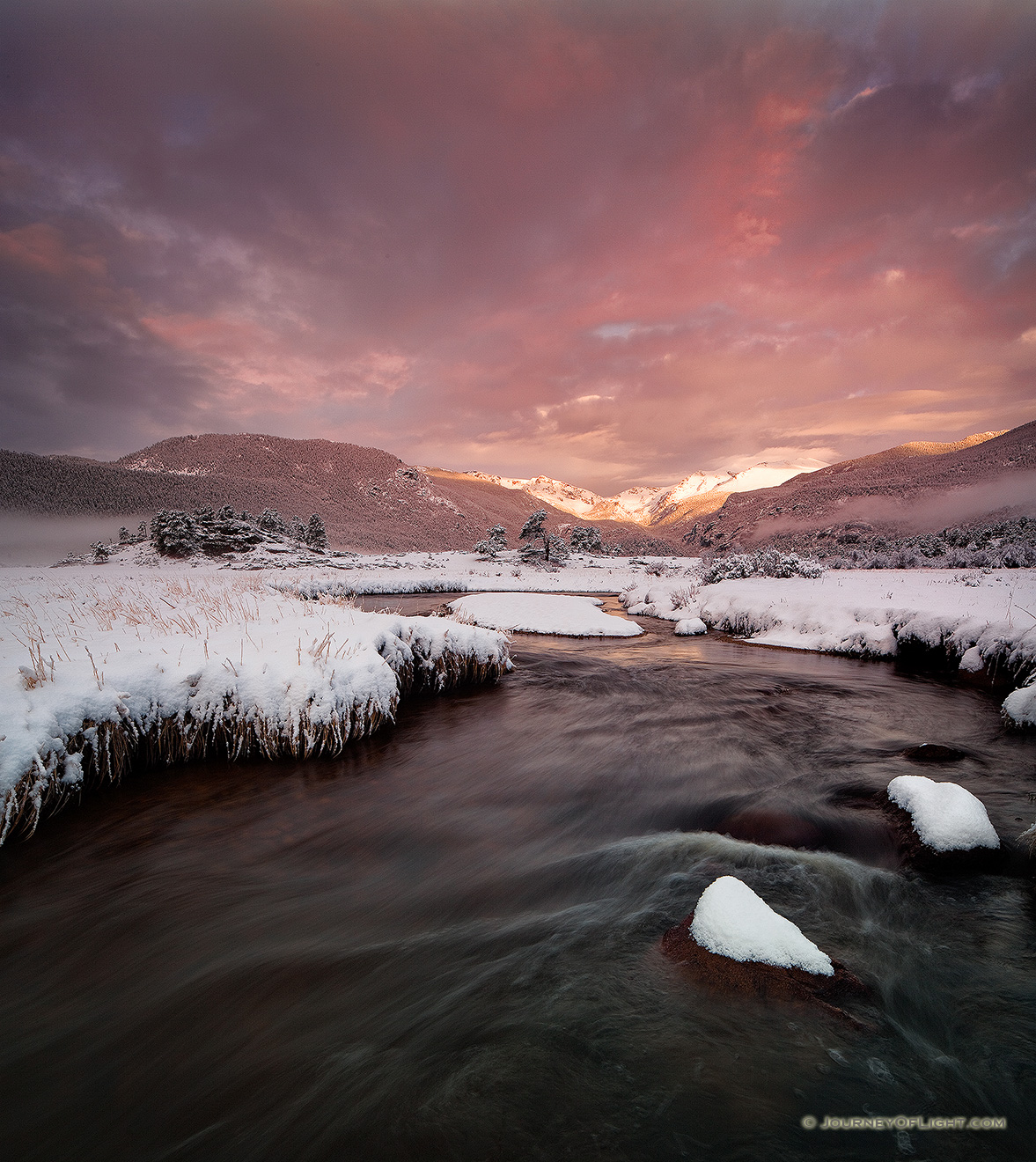 On a cold day in mid-May, the Big Thompson flows through Moraine Park as the first sunlight of the day illuminates the peaks of the Continential Divide. - Rocky Mountain NP Picture