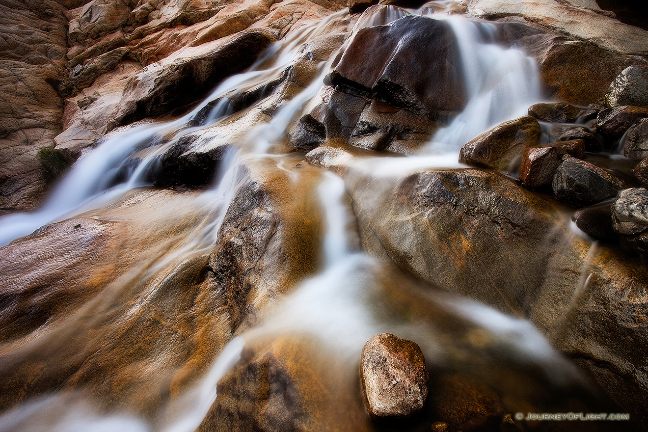 Water flows down Roaring River and into the Alluvial Fan near Horseshoe Park in Rocky Mountain National Park. - Rocky Mountain NP Picture