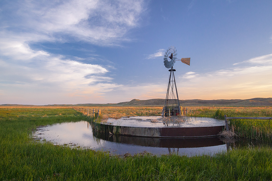 On a breezy evening in Crescent Lake National Wildlife Refuge a windmill stands like a sentinel among the sandhills. - Nebraska Photography