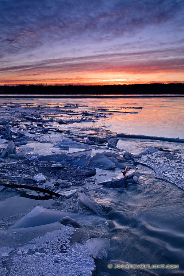 During the winter, the Platte River in Nebraska freezes and then thaws which create these ice jams. - Schramm SRA Photography