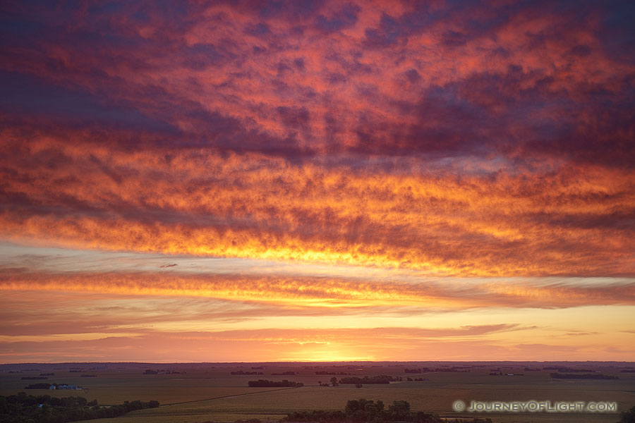 A beautiful sunrise crests over the distant farmland from the scenic overlook at Ponca State Park in Dixon County. - Nebraska Photography