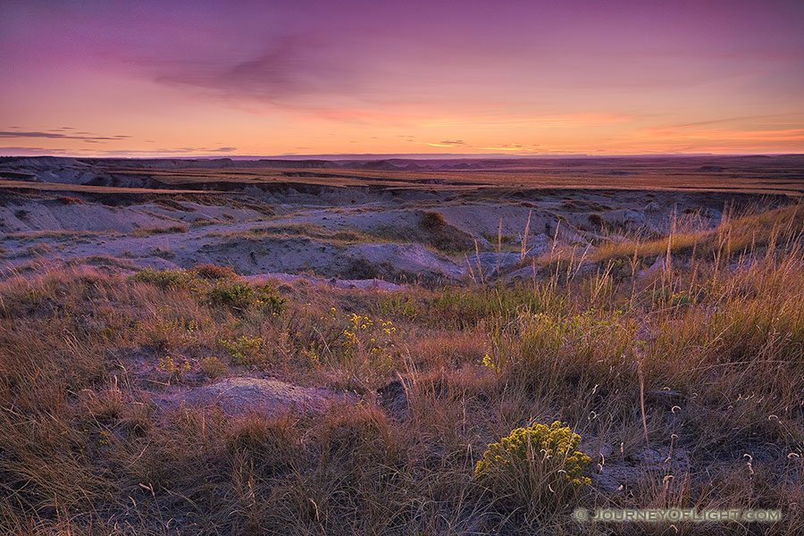 20 minutes past sunset, the very last light of the setting sun gives the prairie off of the Hudson-Meng Trail of the Oglala National Grassland an ethereal glow. - Nebraska Photography
